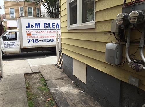 Removing Unwanted appliances from driveway in New York City (after)